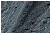 Exposure of Basal South Polar Layered Deposits