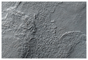 Complex Eroded Or Etched Terrain of Hellas Basin Floor