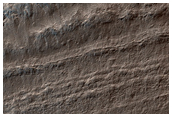 Exposure of Basal South Polar Layered Deposits
