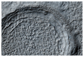 Complex Eroded Terrain of Hellas Basin Floor