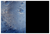 Fractured Crater Fill Material with Some Exposed Layers