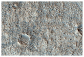 High Thermal Inertia Ejecta in Acidalia Planitia