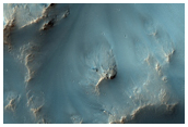 Dissected Terraces and Floor of Unnamed Crater North of Hellas Basin