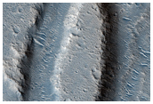 Faded Ray from Tomini Crater and Hebrus Valles Streamlined Islands