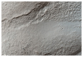 Sirenum Terra Crater Floor Graben and Deposits