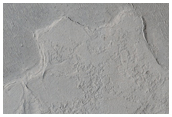 Abrupt Morphologic Transitions in Elysium Planitia