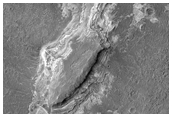 Light-Toned Layered Rock Outcrop in Ladon Vallis