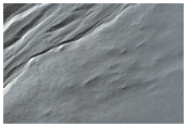 Gullies Associated with Resistant Layers