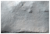 Young Thinly-Mantled Crater
