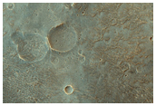 Etched Terrain with Possible Layering West of Juventae Chasma