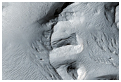 Channel Features Near Memnonia Sulci