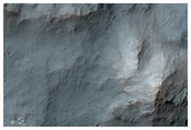 Central Pit and Chaos of A Lage Impact Crater