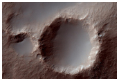Large Central Peak and Layered Fill of An Ancient Crater