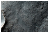 Centauri Montes Massif Apron Material Contact with Upland