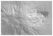 Fresh Unnamed Crater with Ponded Pitted Materials