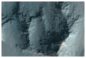 Fan Feature and Relation to Layered Wall-Rock in East Coprates Chasma