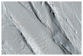 Erosional Exposure in Chaotic Terrain