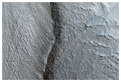 Lobate Flow Features Emanating From Alcoves in Deuteronilus Mensae