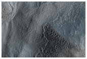 Lineated Valley Flow and Dissected Mantle Terrain in Chaotic Region