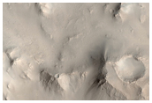 Central Peak and South Rim of Large Fresh Crater in Isidis Basin