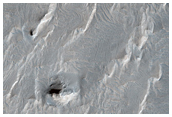 Interior Layered Deposits in Tithonium Catena