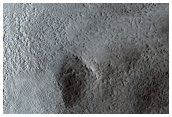 Nilo Syrtis Dichotomy Boundary Scarp or Crater