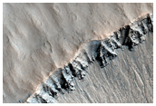 Fresh Double-Layered Crater with Possible Ponded Materials