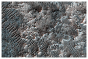 Southern Highlands High Thermal Inertia and Spectrally-Distinct Materials