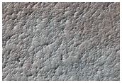 Deposit on Floor of Crater Northeast of Arkhangelsky Crater