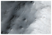 Unnamed Valley in Terra Sirenum Connected to Crater