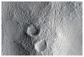 Search for Possible Phyllosilicates in Crater Near Mamers Vallis