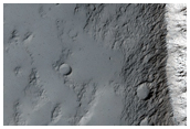 Windblown Sediment Distribution Around Crater in Daedalia Planum