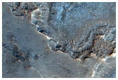 Etched Terrain with Possible Layering West of Juventae Chasma
