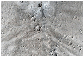 Impact Site Formed between June 1999 and December 2001