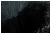 Gullies Below Overhangs in Depression Wall Seen in MOC Image R15-00704