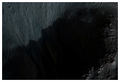 Gullies Below Overhangs in Depression Wall Seen in MOC Image R15-00704