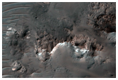 Light-Toned Rock in Central Peak of Alga Crater