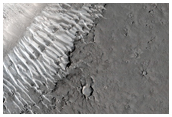 Ring and Cone Structures in Grjota Valles