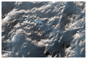 Light-Toned Material on Floor of Pit in Noctis Labyrinthus