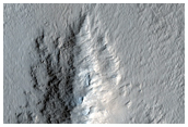 Interaction between Unnamed Crater Ejecta and Pre-Exsisting Terrain