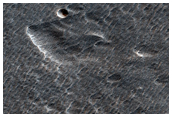 Impact Crater on Northern Plains