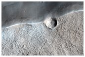 Mounds and Pits on Crater Floor