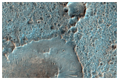 Olivine-Rich Ponded Materials in Unnamed Crater North of Ophir Chasma