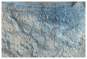 Crater in Scalloped and Pitted Terrain in Utopia Planitia