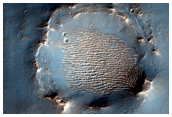 Light-Toned Layered Deposits Along Plains South of Ius Chasma