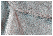 Overlapping Ridges Near Margin of Olympia Mensae