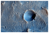 Ejecta Flow Around Small Crater South of Bamberg Crater