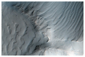 Finely-Gullied Debris on Slope Seen in MOC Images E10-02013 and S02-01076