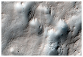 Odd Pitting within Ejecta of Hesperia Planum Crater