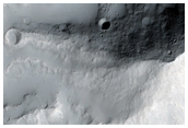Well-Preserved Large Crater with Central Peak in Memnonia Region